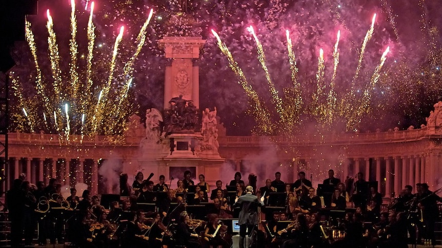 Fireworks above an orchestra