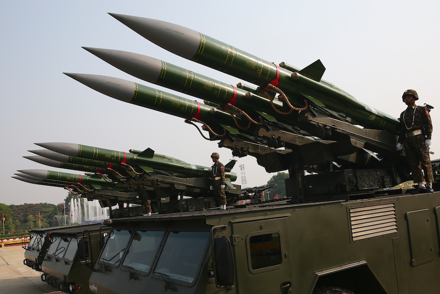 Tanks with missiles during parade.