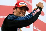 'Incredible day': Mark Webber celebrates on the podium after breaking through for his maiden win.