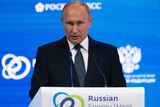 Russian President Vladimir Putin speaks at the Russian Energy Week International Forum in Moscow.