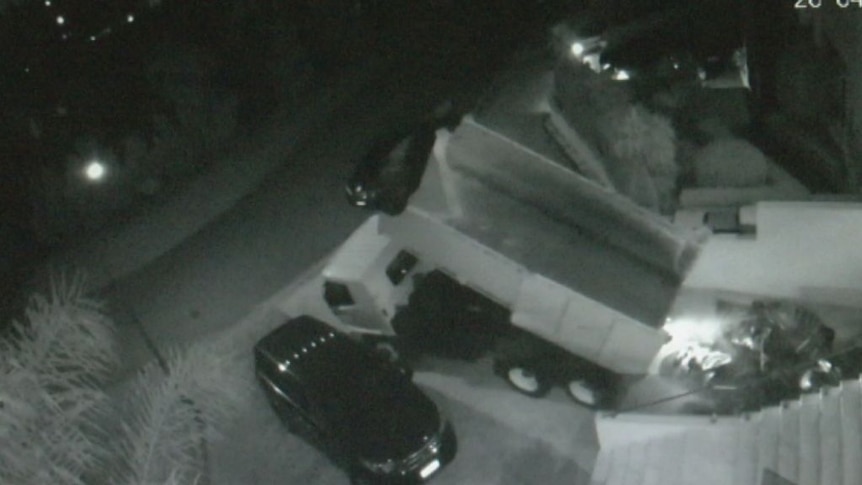 CCTV vision captures truck dumping suspected asbestos in driveway of Sydney home