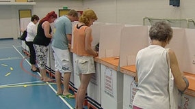 Voters at a polling booth