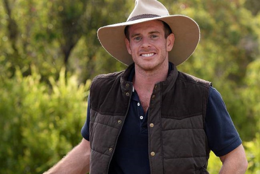 Mid shot of a man in an Akubra hat.