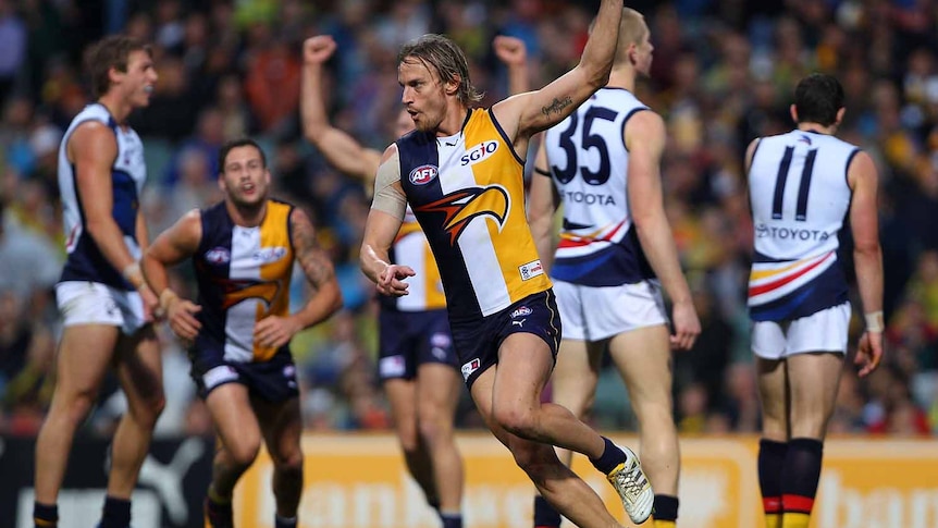 Running riot ... Mark Nicoski kicked three goals as the Eagles had it easy against Adelaide.