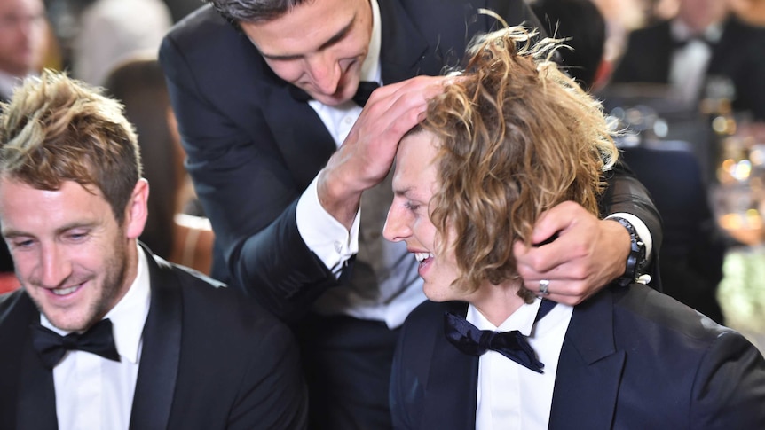 Matthew Pavlich congratulates Nat Fyfe at the 2015 Brownlow Medal ceremony