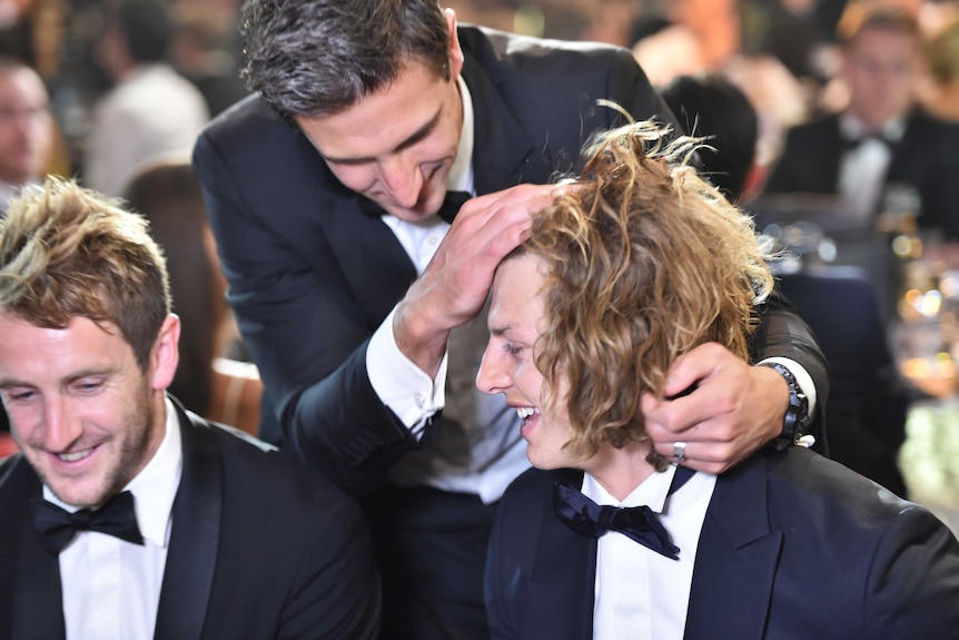 Matthew Pavlich congratulates Nat Fyfe at the 2015 Brownlow Medal ceremony