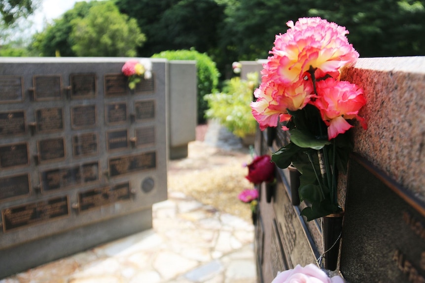 A memorial wall at a crematorium garden