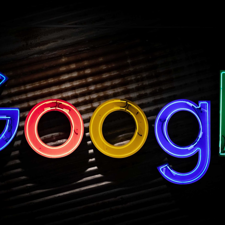 Google's logo in neon lights.