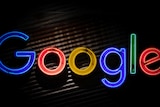 Google's logo in neon lights.