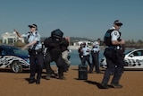 ACT Policing participating in the Running Man dance challenge.