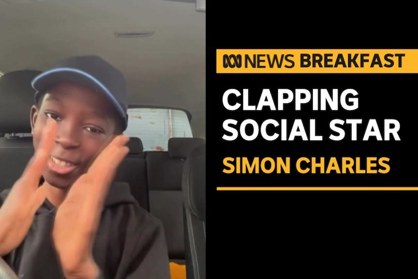 Clapping Social Star, Simon Charles: Boy in the front seat of a car clapping.