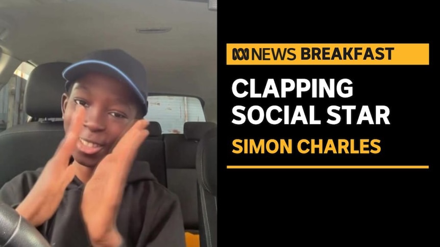 Clapping Social Star, Simon Charles: Boy in the front seat of a car clapping.