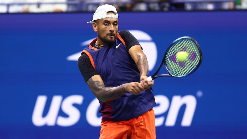 Nick Kyrgios hits a ball during the US Open first round against Thanasi Kokkinakis