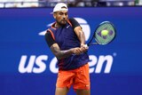 Nick Kyrgios hits a ball during the US Open first round against Thanasi Kokkinakis