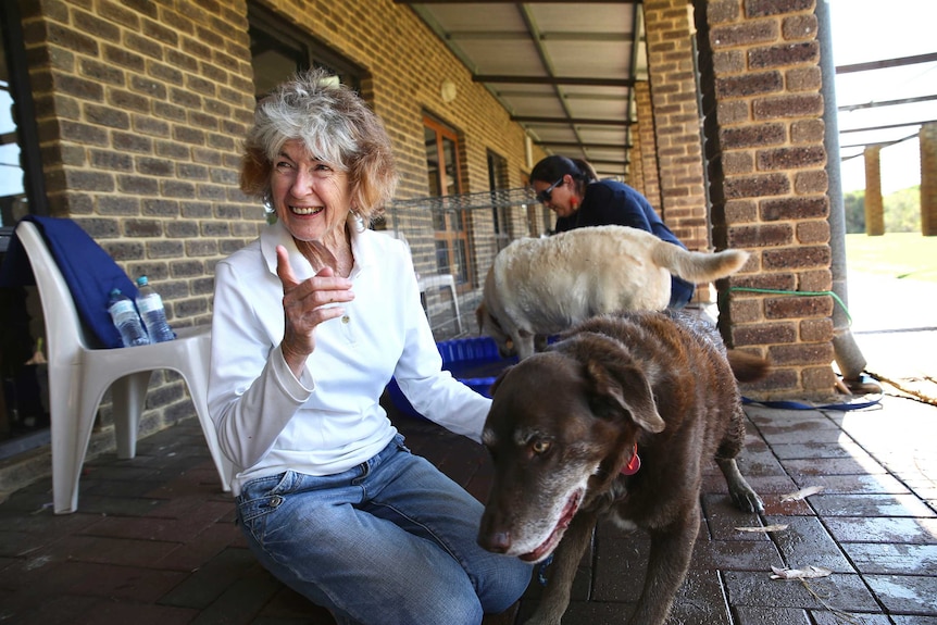 Dale Kelleher and her 14-year-old dog Red