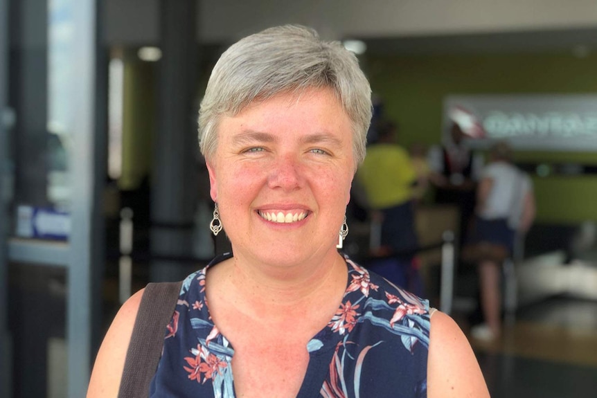 Jo Smethurst smiles as she stands outside Longreach Airport.