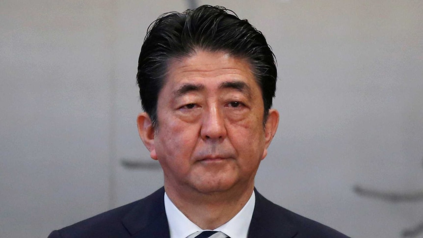 Shinzo Abe attends a meeting of the Imperial Household Council.