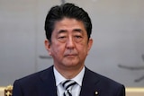 Shinzo Abe attends a meeting of the Imperial Household Council.