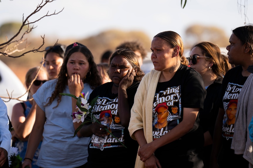 Mourners at Cleveland Dodd's burial in Meekatharra.