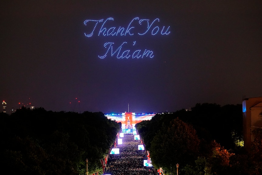 Drones form the shape of the words "thank you ma'am" above Buckingham Palace