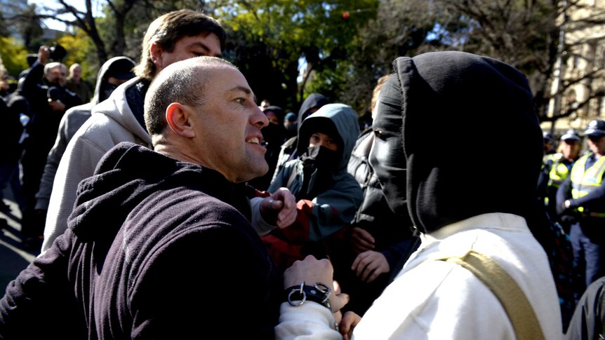 Protesters clash during rival rallies in Melbourne