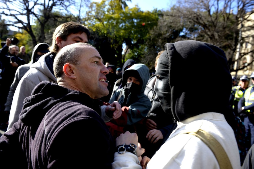 Protesters clash during rival rallies in Melbourne