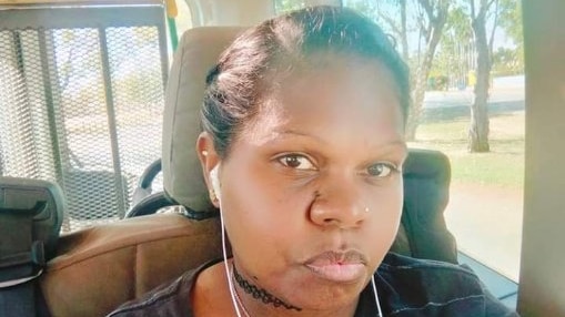 an aboriginal woman wearing headphones