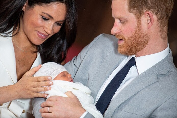Prince Harry and Meghan, Duchess of Sussex hold their baby son.