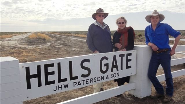 The Patersons with the Hells Gate sign