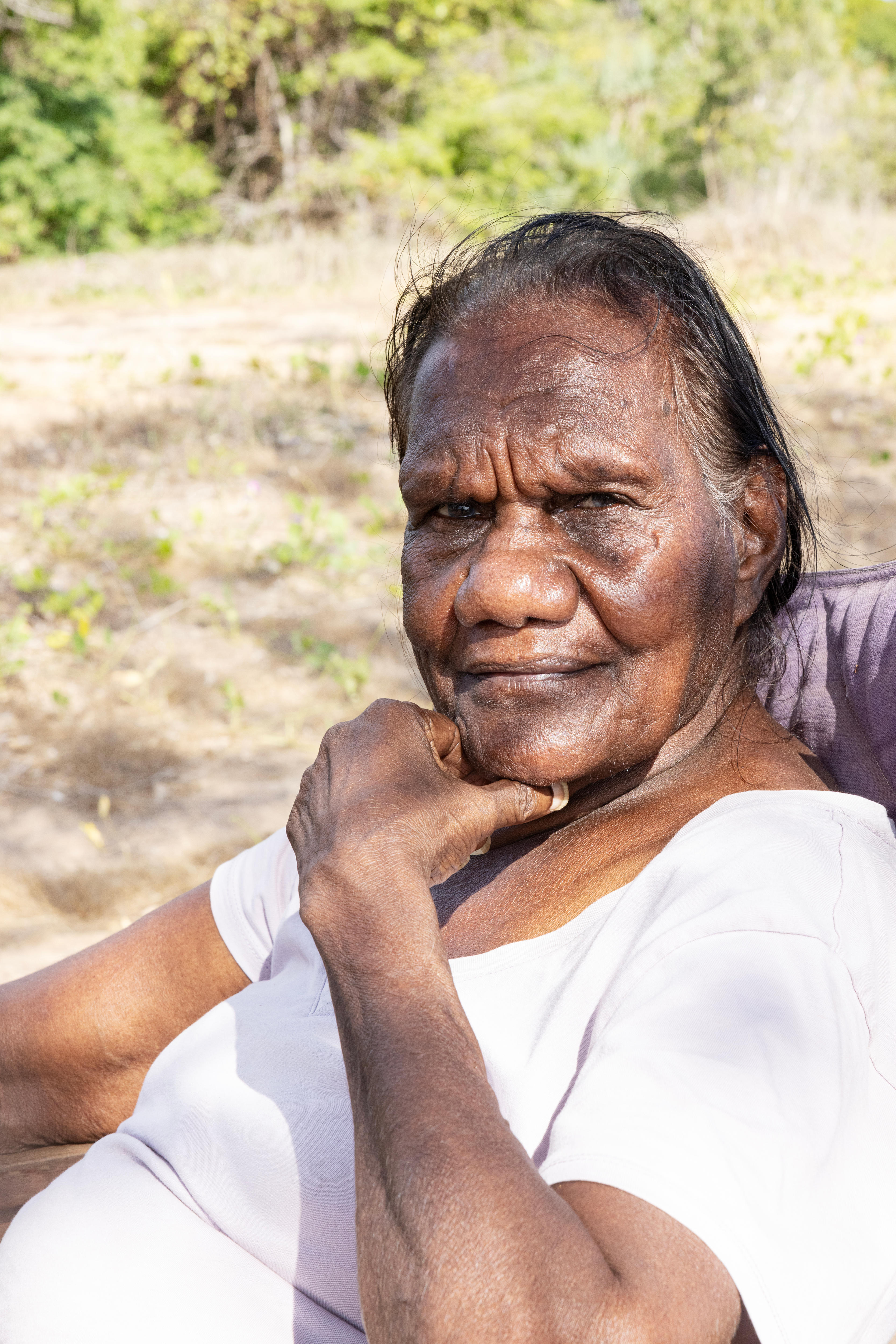 Portrait photo of an elderly woman.