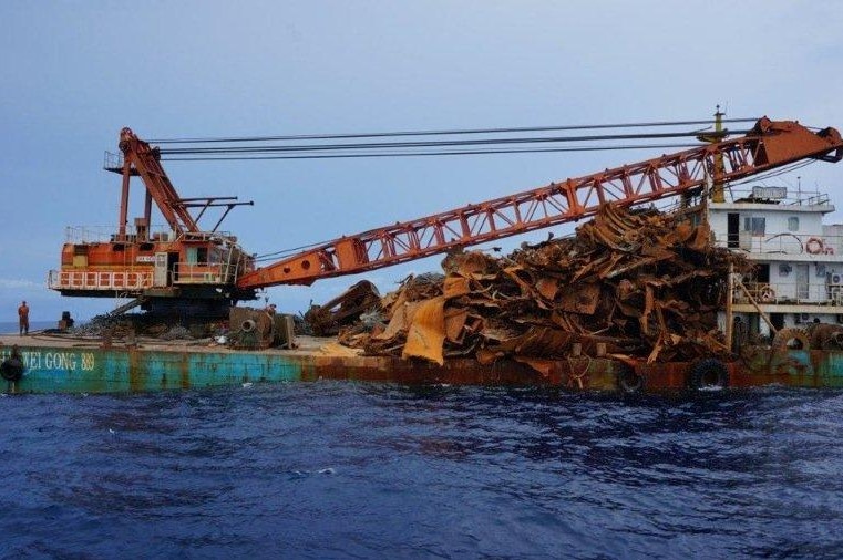 A salvage crane caught stripping the wreck of a Dutch submarine in October