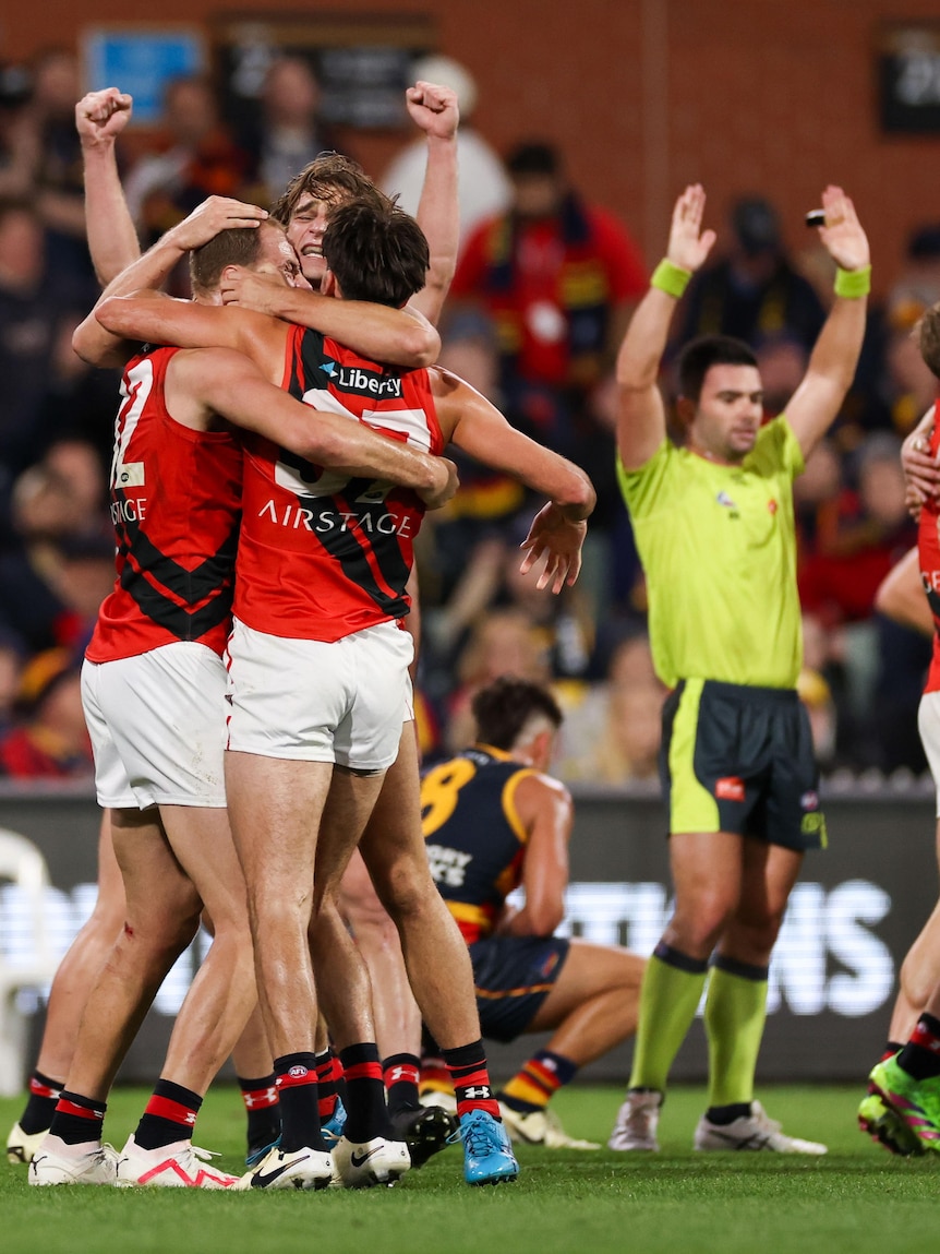 Bombers prevail while Crows fume as contentious decision denies Adelaide chance to steal win