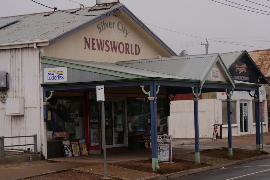 The Silver City Newsworld newsagency building outside  surrounded by cloudy weather