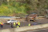 Wreckage from a freeway crash in the Adelaide Hills, which claimed a life.