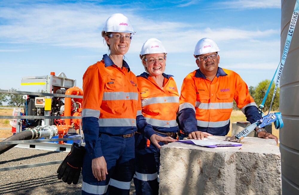 Adani workers at a water bore on the central Queensland mine site, a promotional image from company's Australian website.