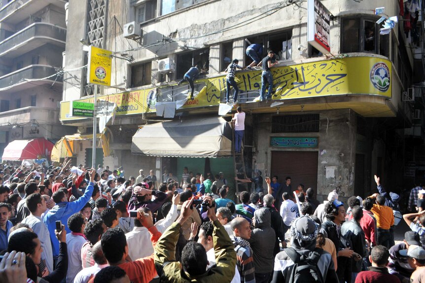Protesters break into the office he political arm of the Muslim Brotherhood in the Mediterranean port city of Alexandria.