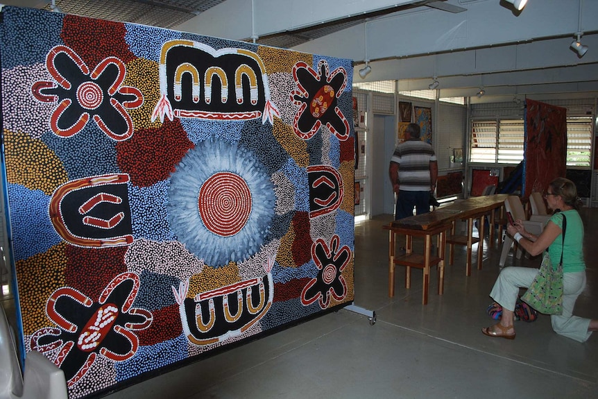 A huge, wall-sized Aboriginal dot painting as part of the showcase at Fannie Bay Gaol.