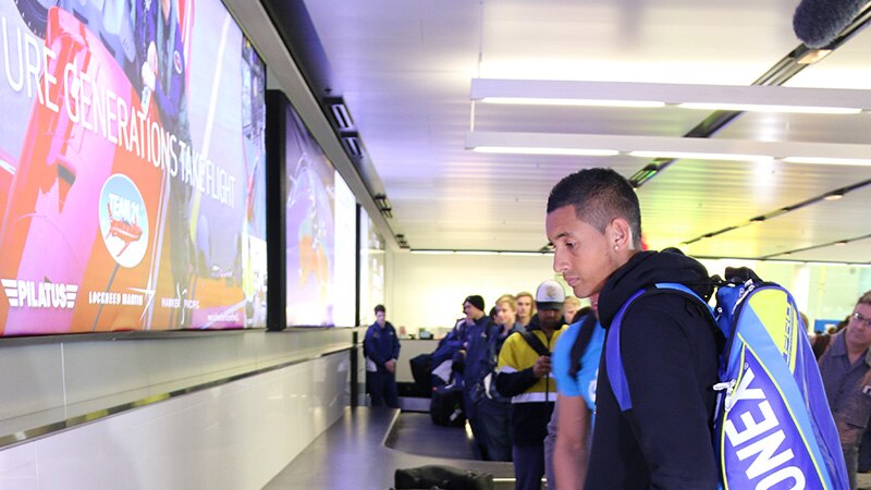 Nick Kyrgios arrives at Canberra Airport after his impressive Wimbledon debut.
