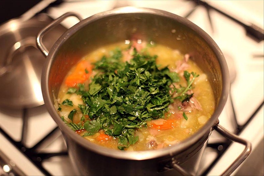 A pot full of vegetable soup
