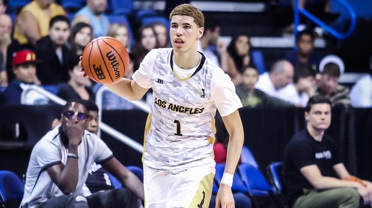 LaMelo Ball dribbles the ball down the court.