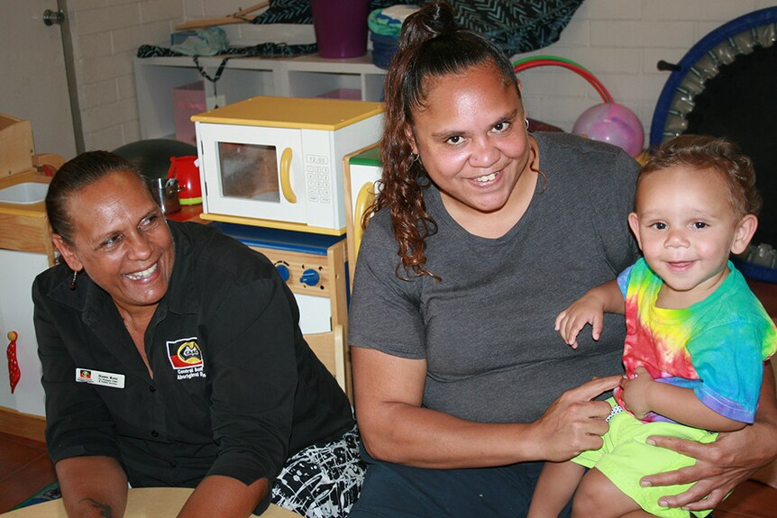 Dawn Ross, Senior Manager of Child and Family Services at Congress, Victoria Croker and son Matthew Rosas