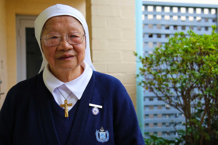 Sister Jacinta Fong stands in the garden of the Darlinghurst convent.