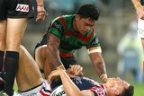 South Sydney's Isaac Luke checks on the Roosters' Sonny Bill Williams