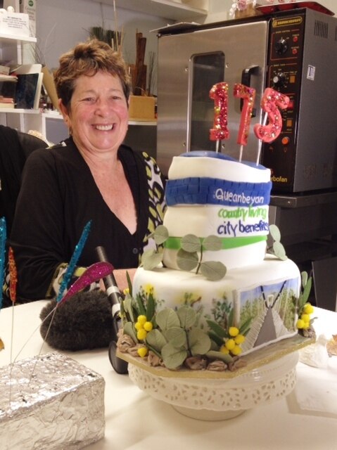 Lorraine Kiewiet with the top tier of her cake for Queanbeyan's 175th birthday celebrations.