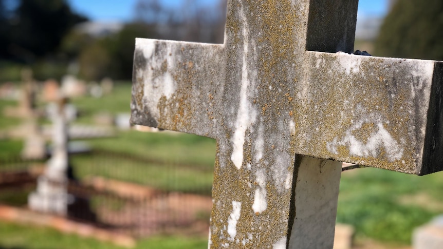 Cross headstone.