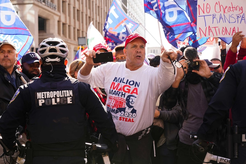 Supporters of President Donald Trump yell at counter-protesters.