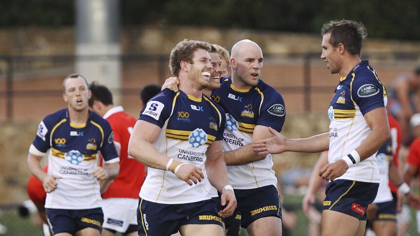 The Brumbies could lose stars like David Pocock (2L) to the Wallabies at the business end of the Super Rugby competition.