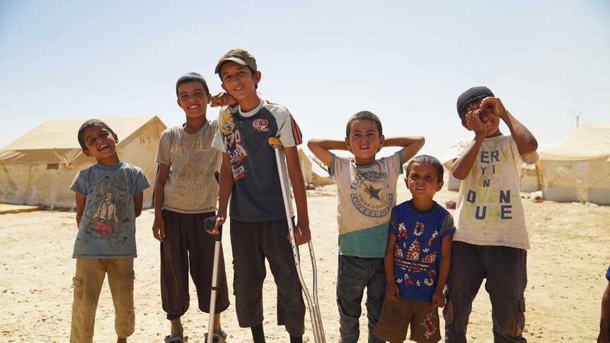 Six young boys in the al-Hawl camp in Syria