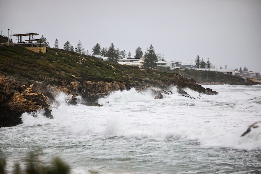 Waves crash into the coast at Marmion beach in Perth.