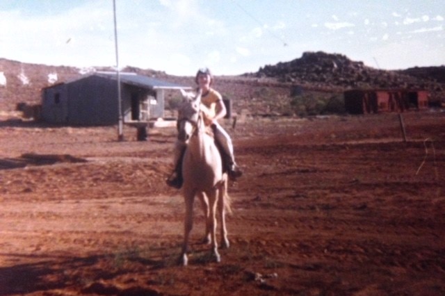 Tracey Hayes on horseback as a young girl on her family's property.